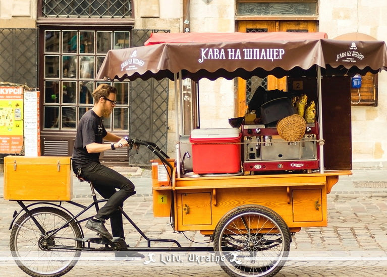 Postcard featuring a mobile coffee shop in Lviv