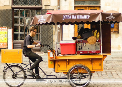 Postcard featuring a mobile coffee shop in Lviv