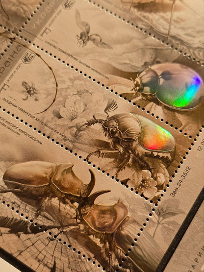 Insects of Ukraine 2024. Souvenir Holographic stamps sheet with perforation.